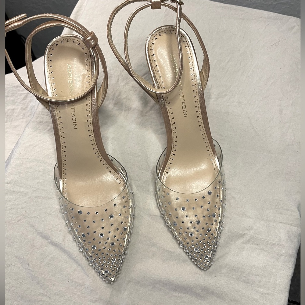 Shiny rhinestones sprinkle the clear toe of Adrienne Vittadini's Nerve pump